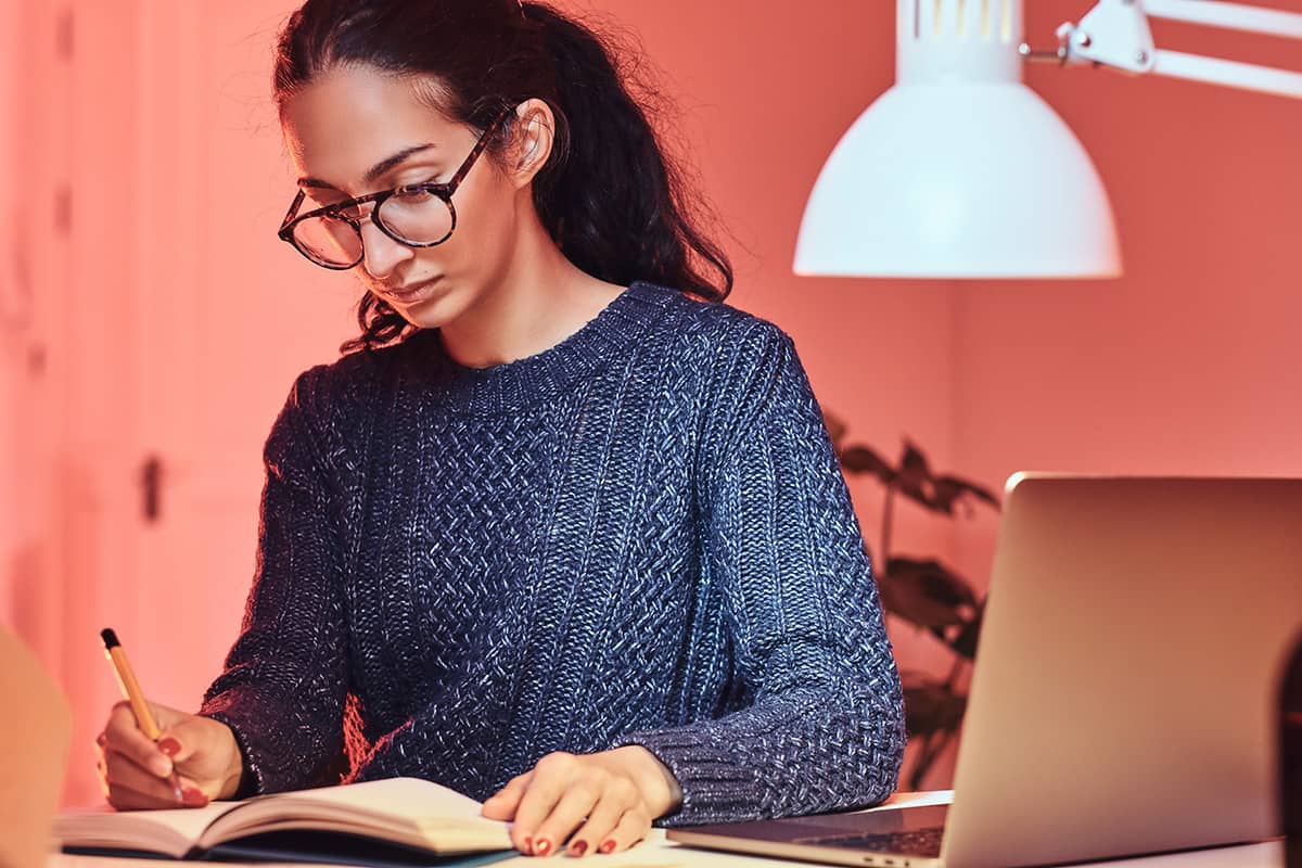 A woman studying to improve her life and career.